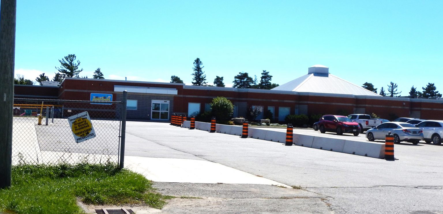 Concrete barriers create temporary confusion in Walkerton school parking lot