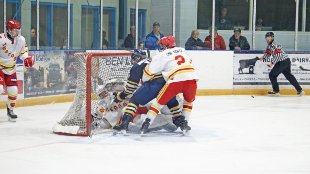 The Ironmen faced off against the Hanover Barons at home on Oct. 11. Pictured is Barons’ defenceman Robert Nicholson fending off Ironman forward Noah Wettlaufer during an attempt at a goal on the Barons’ net. Barons took the win with a final score of 4 - 1. (Rachel Hammermueller photo)